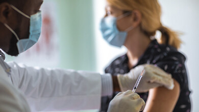 First person receives Pfizer Covid-19 vaccine in UK